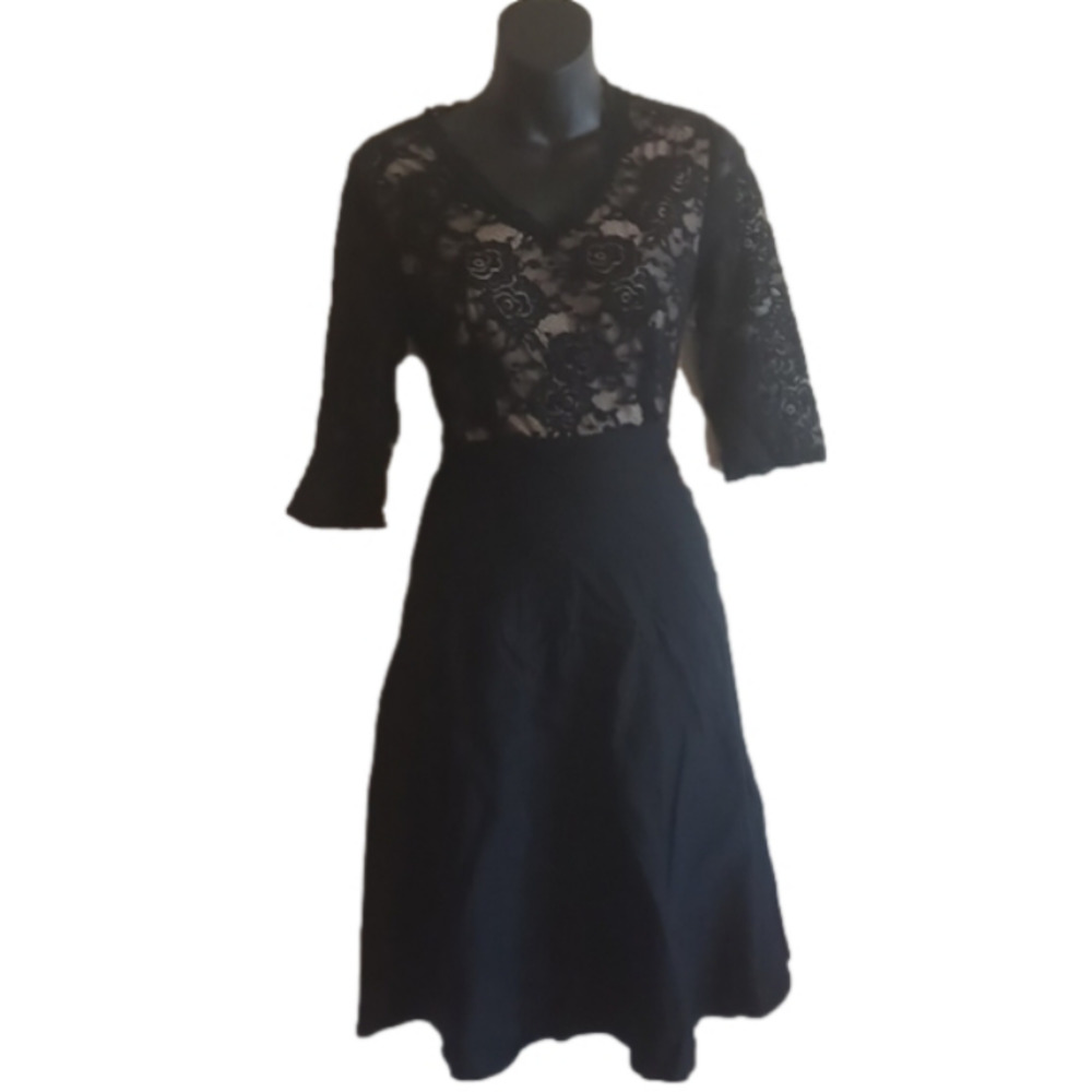Lacey Homeyee Black fall party dress. Size 8, zips up the side.